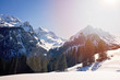 Snow covered mountains alpine Landscape during winter in Switzerland