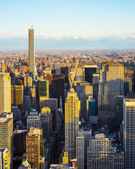 Wall Mural - Aerial panoramic view to Midtown Manhattan and Central Park, NYC, USA. Skyline with skyscrapers at sunset. New York city. American architecture building. Panorama of Metropolis. Cityscape