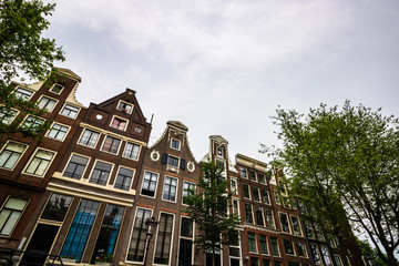 Wall Mural - Traditional old canal houses and buildings of Amsterdam, Netherlands