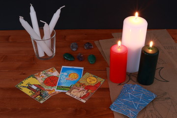 occult magic symbolism and ritual with runes and Tarot cards