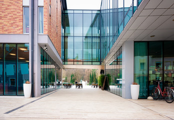 Canvas Print - Modern glass library building in the center of Celje old town in Slovenia. Architecture in Slovenija.