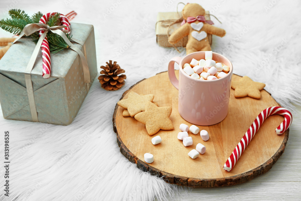 Beautiful Christmas composition with hot chocolate on light background