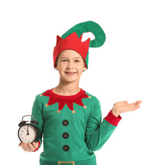 Canvas Print - Little boy in costume of elf and with alarm clock on white background