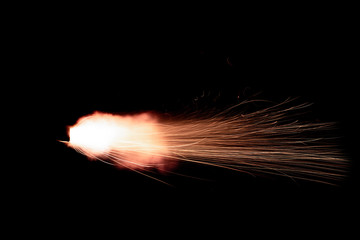 Wall Mural - the texture of a shot from a firearm on a black background, the output of gunpowder gases from the barrel of a rifle and a pistol