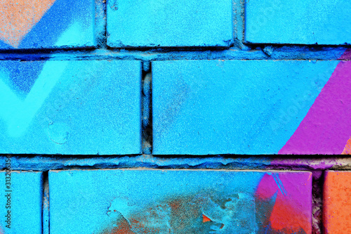 Brick wall painted with acrylic multicolored paint surface for background