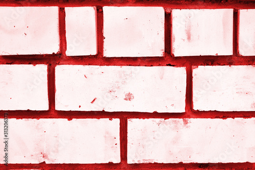 White brick wall painted with acrylic multicolored paint for background