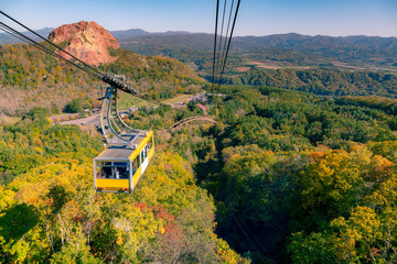 Mt. Moiwa ropeway over multiple colour jungle, Japan natural landscape background