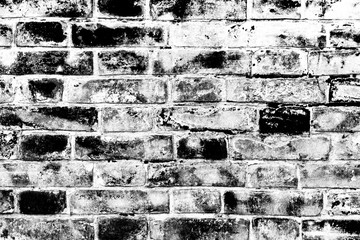 Texture of a brick wall with cracks and scratches which can be used as a background