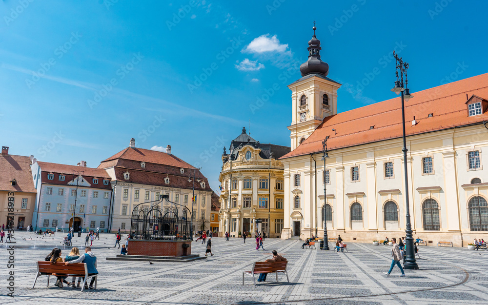 Piata Mare . The main sqaure in the old town of  Sibiu during spring season . One of the most beautiful city which is Unesco sites of the country , Sibiu , Transylvania , Romania - obrazy, fototapety, plakaty 