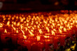 © Sathaporn - Close up lit prayer candles for Chinese new year festival in Black Background.