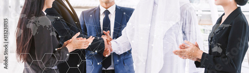 Fotografía Successful businessmen handshake partner with arab businessman