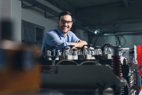 Mechanical engineer working on machines.