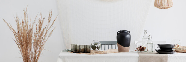 Wall Mural - table in dining room presenting natural materials trend