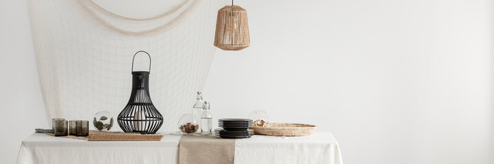 Wall Mural - table with white tablecloth and natural decorations