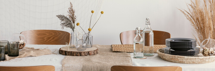 Wall Mural - wooden slices and linen napkins on the table