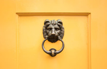 Brass Door Knocker Of Doors Of The Historic City Of Paraty, Brazil, Founded In 1667.