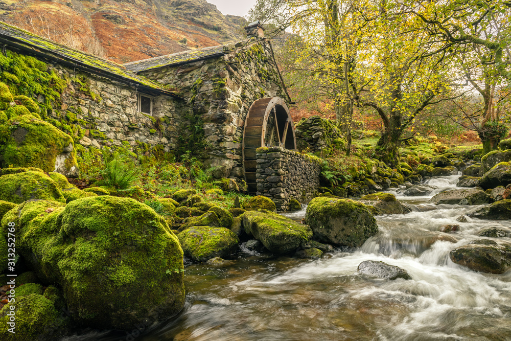 Old mill with a waterwheel built in the early 1800's in Borrowdale in the Lake District, Uk - obrazy, fototapety, plakaty 