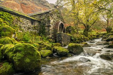 Old mill with a waterwheel built in the early 1800's in Borrowdale in the Lake District, Uk