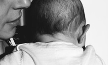 Mother Is Holding Baby. Back Of The Head Of A 6 Month Old Baby Girl, Black And White