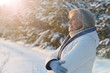 © aletia2011 - Happy beautiful senior woman posing in snowy winter park
