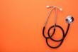 © Mouse family - Medical stethoscope on a orange background. Health care concept