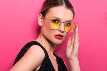 Portrait of beautiful model with close up glasses. Young woman, brunette girl with sunglasses, isolated, commercial poster  ready, studio 