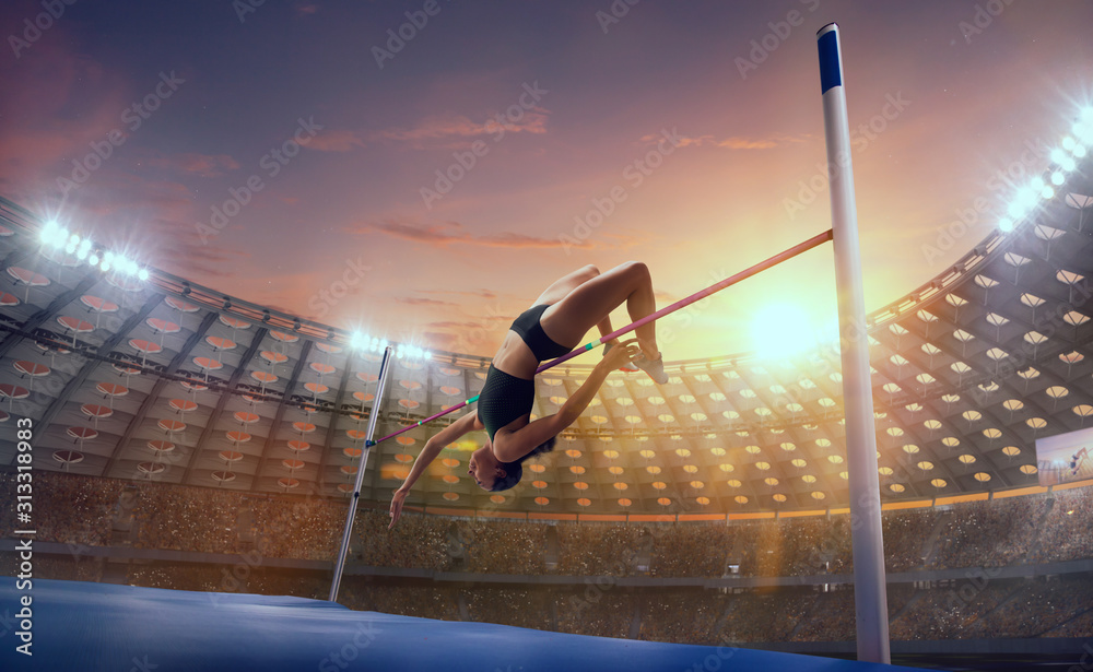 Athlete woman doing a high jump on sport championship. - obrazy, fototapety, plakaty 