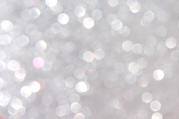 Silver sparkle glitter abstract bright texture , white or gray background