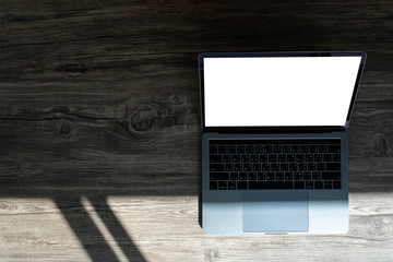 Poster - businessman using laptop at home Laptop with blank screen on table  notebook space
