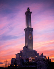 Genoa, Genova, Italy: Amazing Sunset View Of The Lanterna (lighthouse Symbol Of The City). Famous Lighthouses