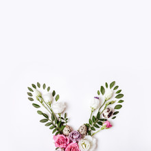 Bunny Rabbit Ears Made Of Roses Flowers, Leaves And Quail Eggs. Happy Easter Concept, Floral Boho Style