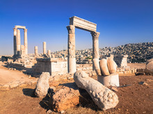 Ruined Columns. Hercules Hand At The Historic Park In Amman. Roman Civilization. 