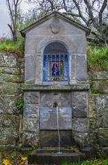 Wall Mural - icon over the well near the church