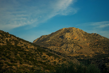 Poster - mountain landscape soft focus peak of rock in twilight lighting time before sunset, blue sky background scenic view