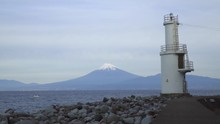 View For Mt. Fuji In Winter From The Coast Of Heda Beach Lighthouse, Shizuoka Prefecture Japan. Across The Sea Of Suruga Bay.