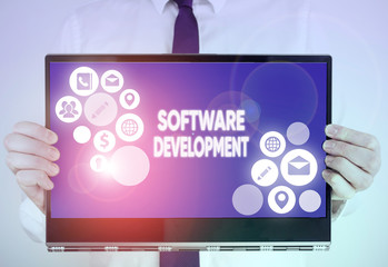 Writing note showing Software Development. Business concept for software is created using a specific programming