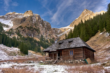 Wooden Cabin In The Mountains