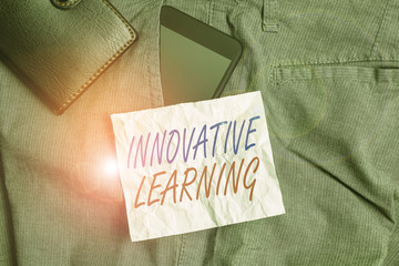 Poster - Text sign showing Innovative Learning. Business photo text Interdisciplinary teaching that stirs analytic thinking Smartphone device inside trousers front pocket with wallet and note paper
