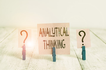 Poster - Text sign showing Analytical Thinking. Business photo showcasing break down complex problems into simple components Scribbled and crumbling sheet with paper clips placed on the wooden table