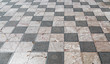 Wide checkered floor with black and white tiles
