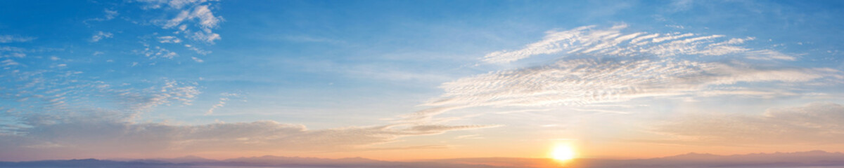 panorama of dramatic vibrant color with beautiful cloud of sunrise and sunset. panoramic image.