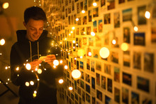 A Young Man In Lights And Memories Photos