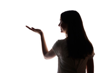 Young woman shows his index finger, hand forward