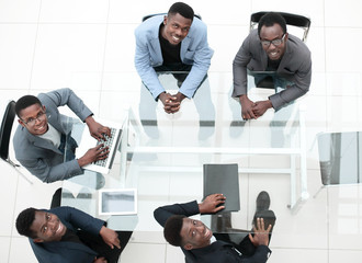 Wall Mural - top view. group of young business people at a meeting in the office