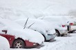 Parking cars covered with snow