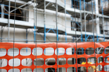 The fence of the construction site. Protective net.