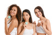 © Pixel-Shot - Beautiful young women with cream on white background
