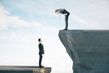 Aufkleber - Two businessman standing on mountain.