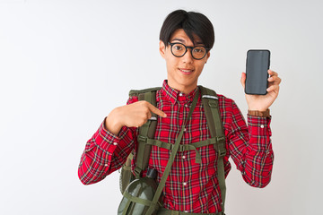 Wall Mural - Chinese hiker man wearing canteen holding smartphone over isolated white background with surprise face pointing finger to himself