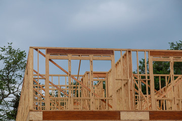 Framing beam of new house under construction home framing